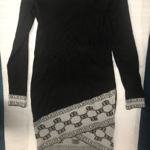 Black sweater dress with detailed edges